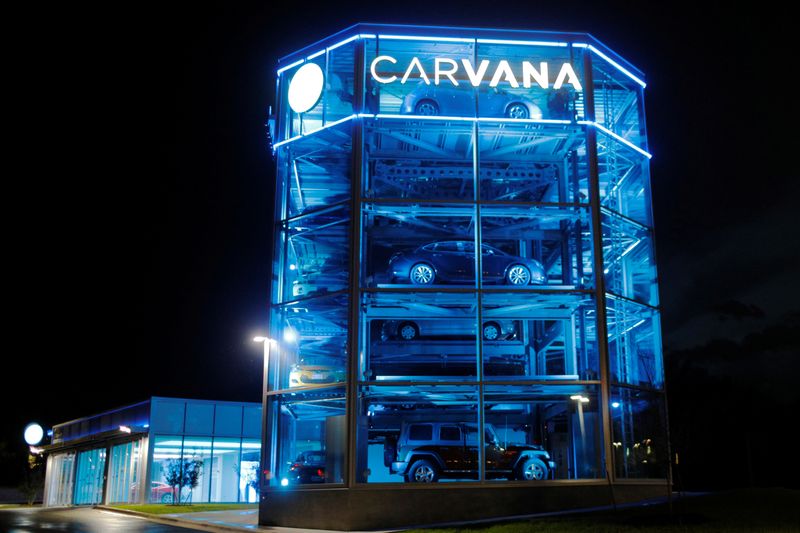 Vehicles are displayed at a Carvana dealership in Austin