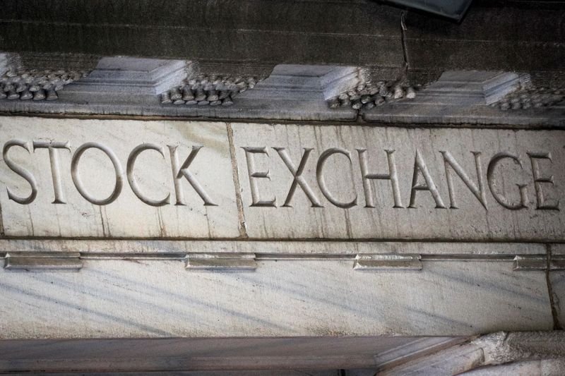 FILE PHOTO: An entrance to the NYSE on Wall Street in New York