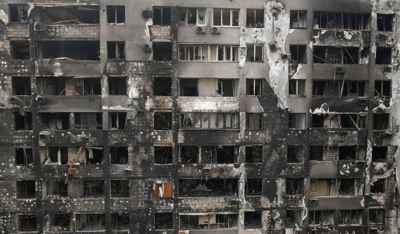 A view shows a destroyed residential building in Mariupol