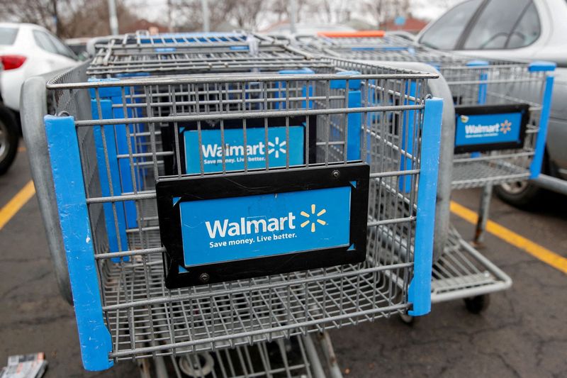 FILE PHOTO: Walmart shopping carts are seen on the parking lot ahead of the Thanksgiving holiday in Chicago