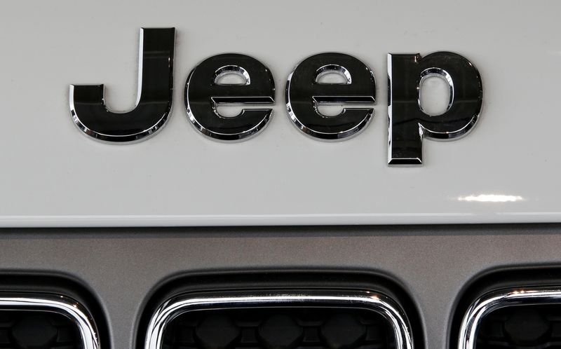 A Jeep logo is seen on a car at a showroom of a dealership in Merignac
