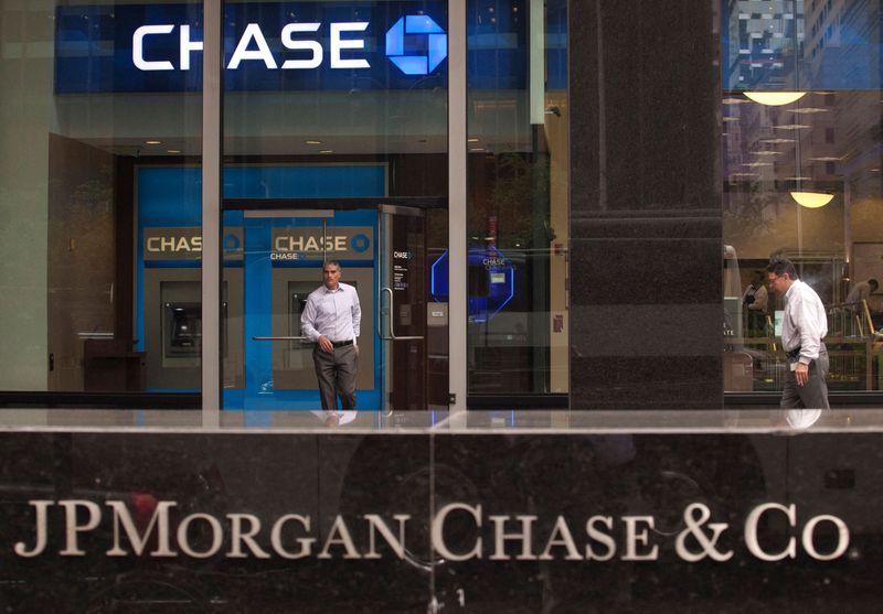 FILE PHOTO: A customer exits the lobby of JPMorgan Chase & Co. headquarters in New York