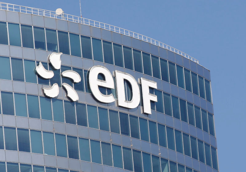FILE PHOTO: The logo of Electricite de France SA (EDF) is pictured on the facade of a building in Paris