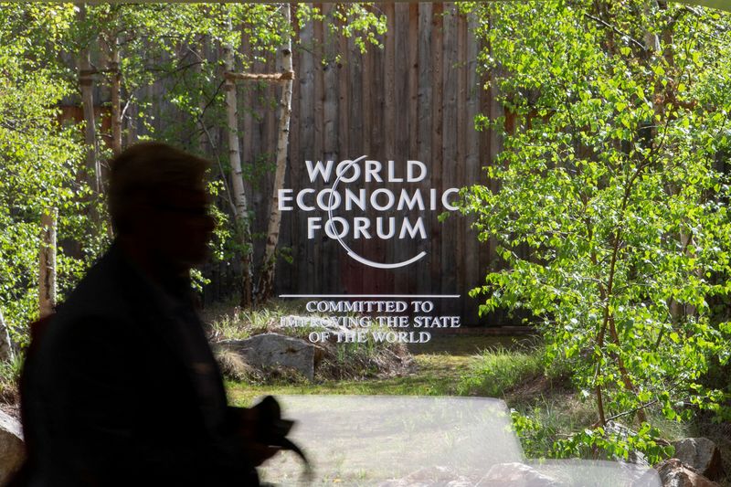 FILE PHOTO: Logo of the upcoming World Economic Forum 2022 (WEF) is pictured in Davos