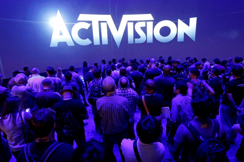 FILE PHOTO: Crowd waits for video presentation at the Activision booth during the 2014 Electronic Entertainment Expo, known as E3, in Los Angeles