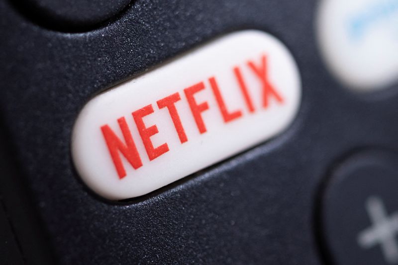 FILE PHOTO: The Netflix logo is seen on a TV remote controller, in this illustration