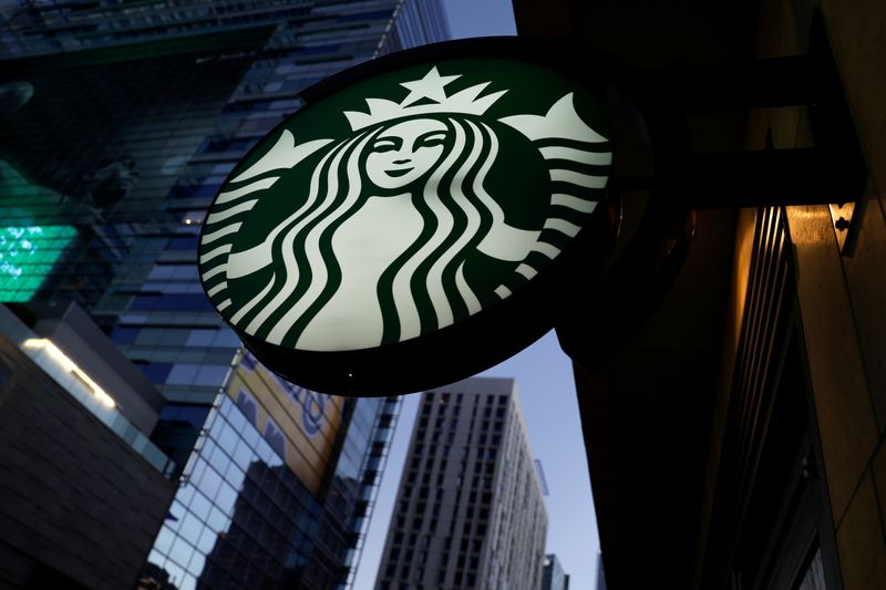 FILE PHOTO: A Starbucks sign is shown on one of the company's stores in Los Angeles