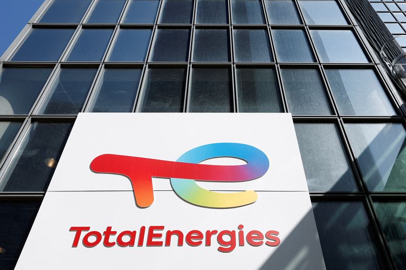 FILE PHOTO: A TotalEnergies sign at the company's headquarters in the La Defense business district in Paris