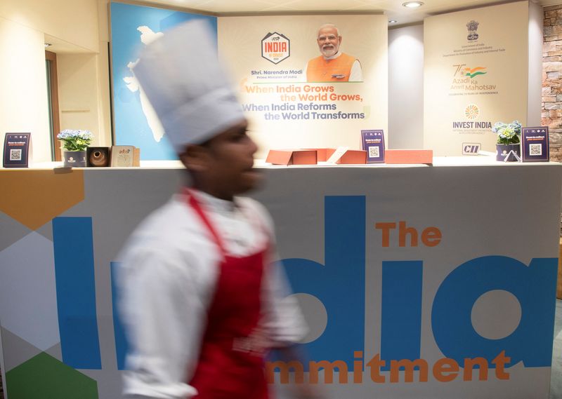 A chef walks past the reception at the India Lounge in Davos