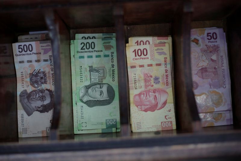 FILE PHOTO: Mexican peso banknotes are pictured at a currency exchange shop in Ciudad Juarez