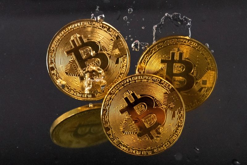 Fichas que representan la criptodivisa Bitcoin
