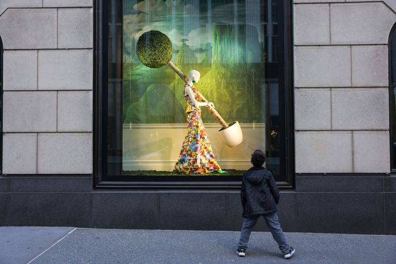 FILE PHOTO: A child stops to look at a Bloomingdales display window in the Manhattan borough of New York City