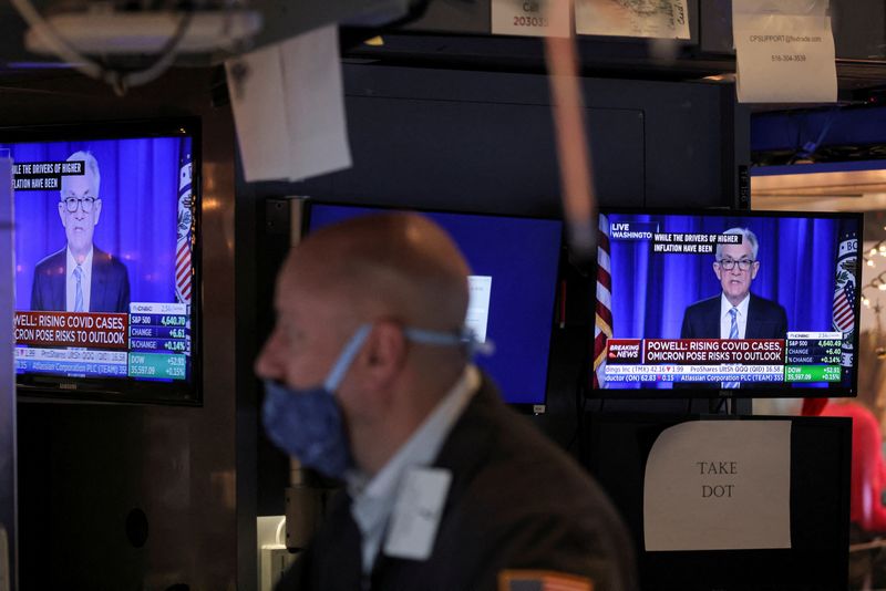 FILE PHOTO: Federal Reserve Chairman Jerome Powell is seen delivering remarks on screen at the New York Stock Exchange (NYSE) in Manhattan