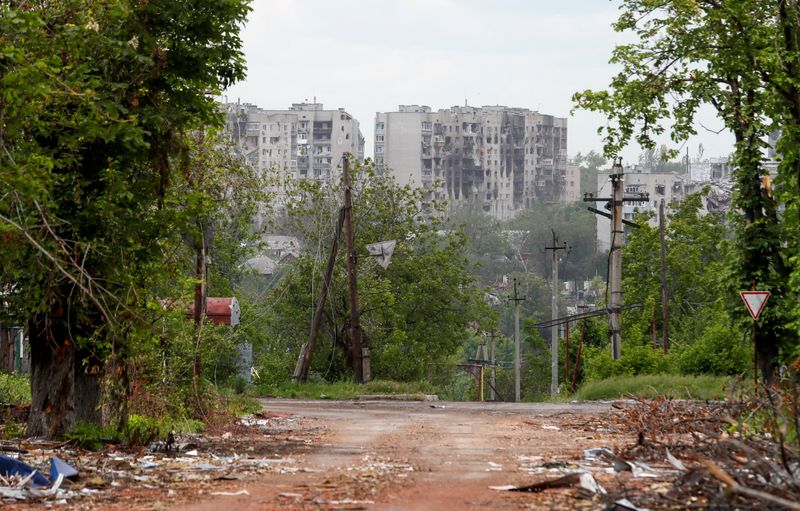 A view shows damaged apartment buildings in Popasna