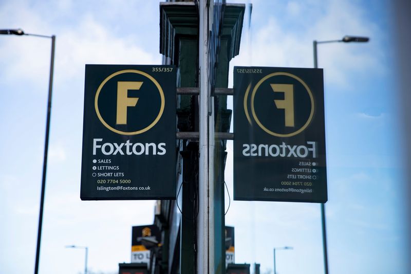FILE PHOTO: A signage is seen outside a branch of Foxtons estate agents in Islington, London