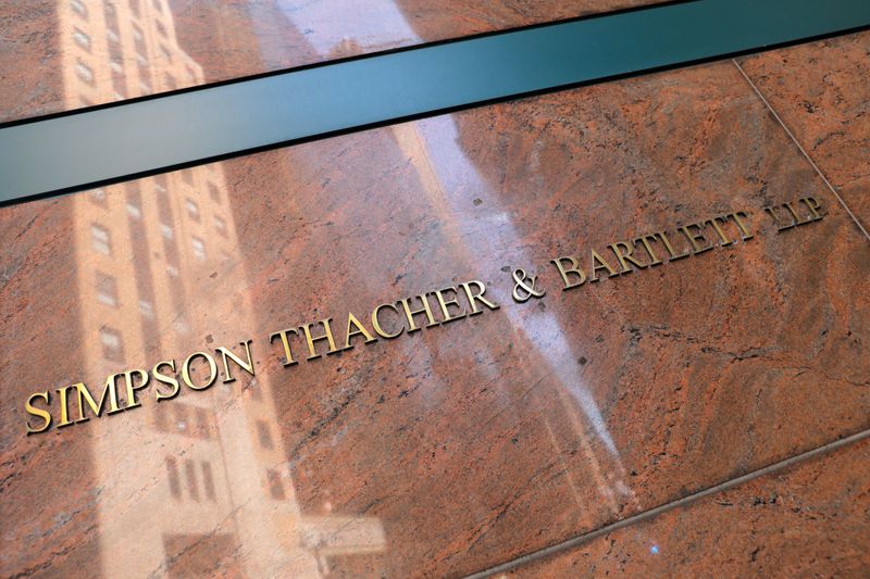 FILE PHOTO: Signage is seen on the building exterior of the law firm Simpson Thacher & Bartlett LLP in Manhattan, New York City