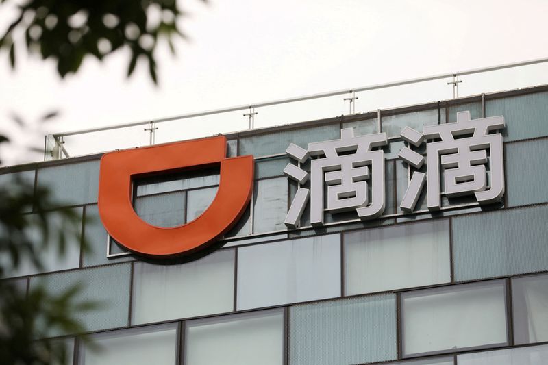 FILE PHOTO: Didi, Lenovo founders go private on China social media, joining retreat from spotlight