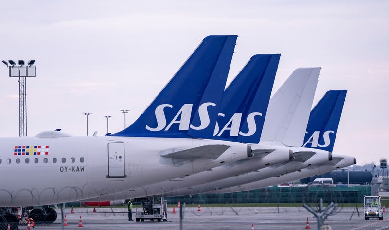 FILE PHOTO: SAS Airbus A320 planes are parked at Copenhagen airport in Kastrup