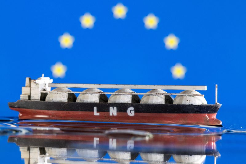 FILE PHOTO: Illustration shows model of LNG tanker and the EU flag