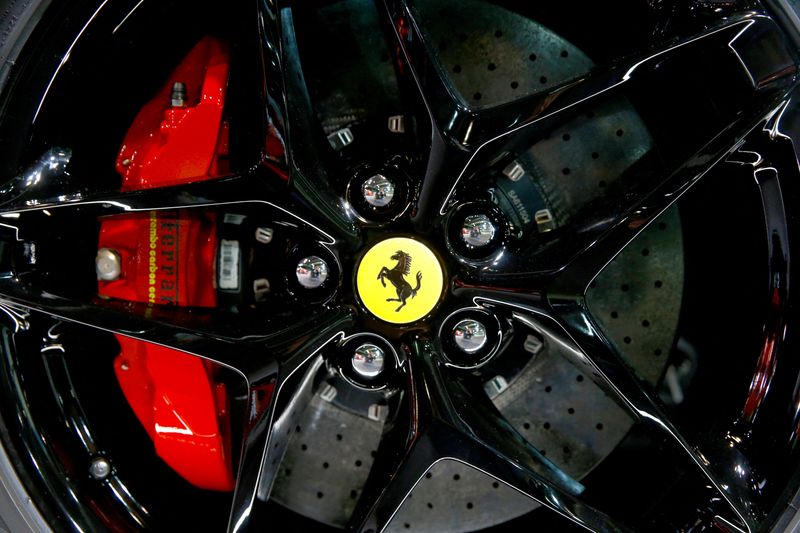 FILE PHOTO: A Ferrari SF90 Stradale hybrid sports car is seen at the Auto Zurich Car Show in Zurich