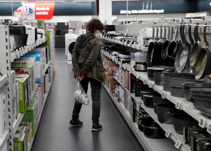 A woman shops at consumer electronics retailer Media Markt in Budapest