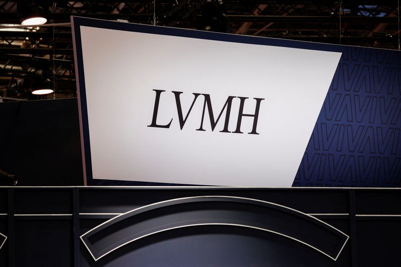 FILE PHOTO: A logo of LVMH is seen at its exhibition space, at the Viva Technology conference in Paris