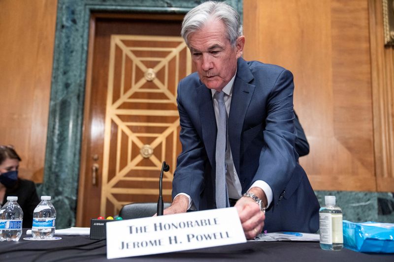 FILE PHOTO: Federal Reserve Chairman Jerome Powell arrives to testify before the Senate Banking Committee, in Washington, D.C.