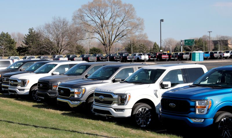 FILE PHOTO: Newly manufactured Ford Motor Co. 2021 F-150 pick-up trucks are seen waiting for missing parts in Dearborn