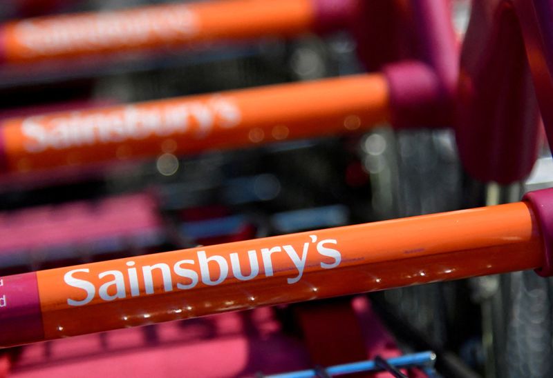 FILE PHOTO: Branding is seen on a shopping trolley at a branch of the Sainsbury's supermarket in London