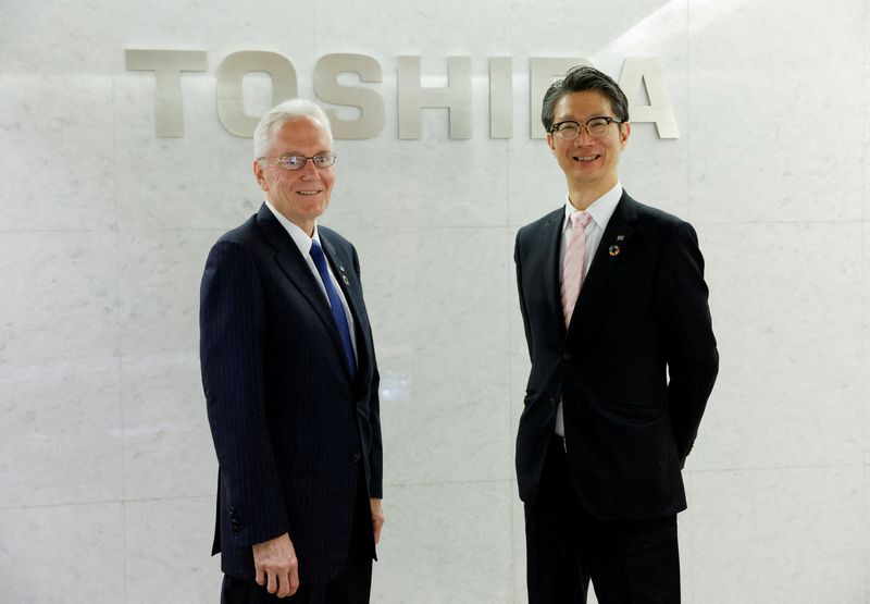 FILE PHOTO: Toshiba Corp. Chief Executive Taro Shimada and external director Jerry Black pose for a photograph during an interview in Tokyo