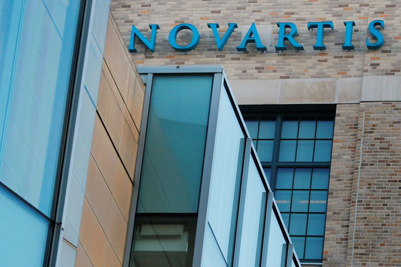 FILE PHOTO: A sign marks Novartis' Institutes for Biomedical Research in Cambridge