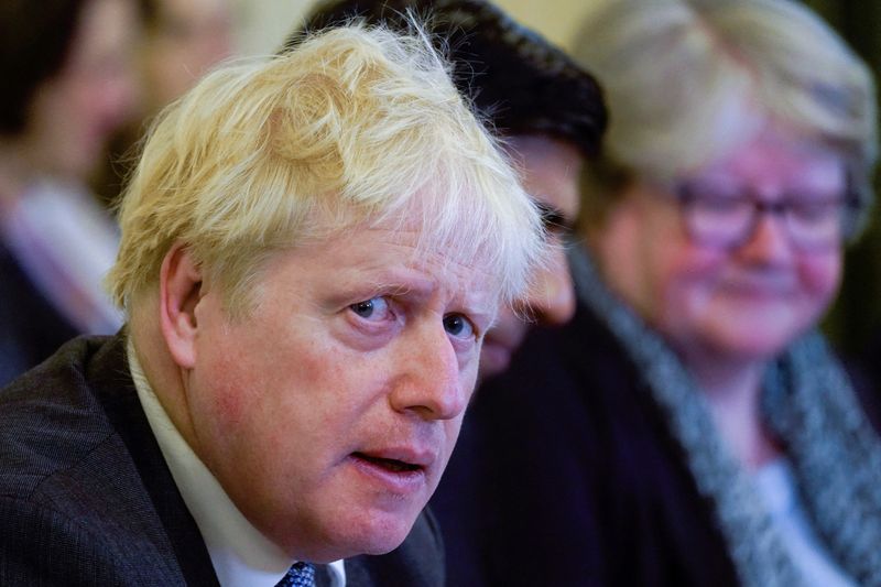 FILE PHOTO: Britain's Prime Minister Boris Johnson speaks during a cabinet meeting at 10 Downing Street in London