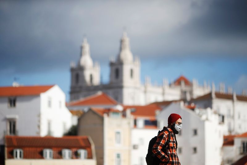 A man wears a protective mask during the coronavirus disease (COVID-19) pandemic in Lisbon