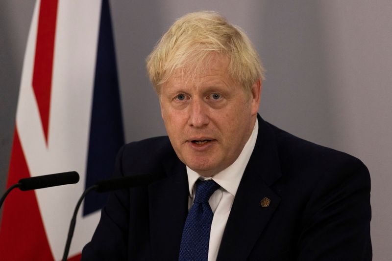 British Prime Minister Boris Johnson attends a news conference during the Commonwealth Heads of Government Meeting (CHOGM) at Lemigo Hotel, in Kigali