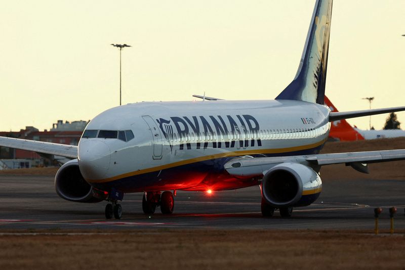 FILE PHOTO: A Ryanair plane prepares to take off from Lisbon Humberto Delgado Airport