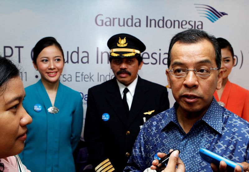 FILE PHOTO: CEO of Indonesia's Garuda Satar speaks to reporters during the airline's initial public listing in Jakarta