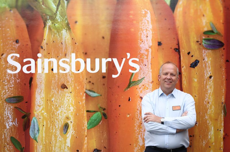 Chief Executive Officer of Sainsbury's Simon Roberts poses inside a Sainsbury’s  supermarket in Richmond, west London