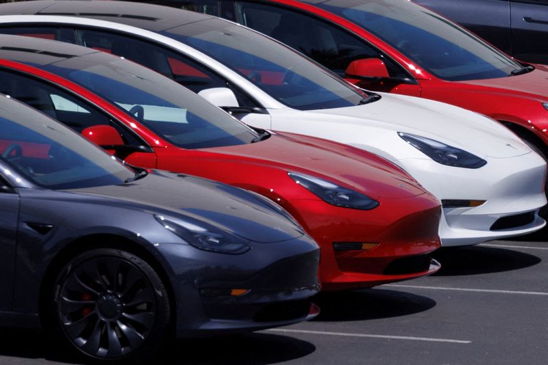 FILE PHOTO: Tesla vehicles are shown at a sales and service center in Vista, California