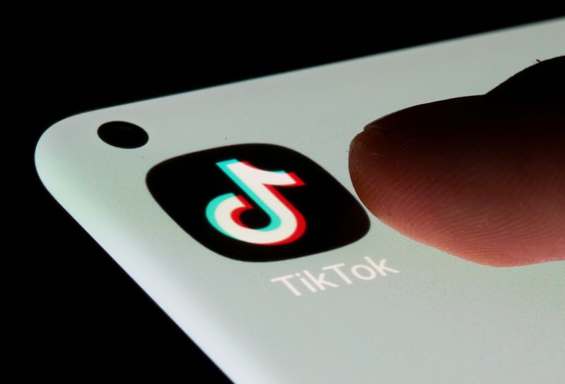 TikTok app is seen on a smartphone in this illustration