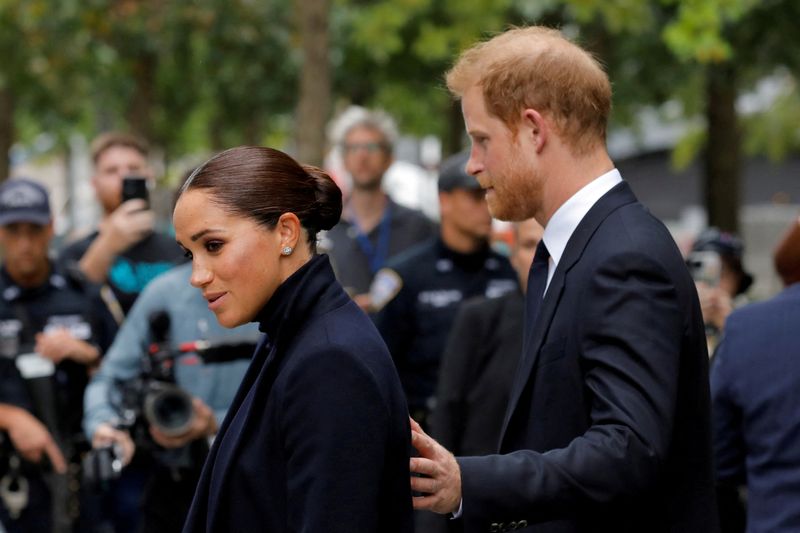 FILE PHOTO: Britain's Prince Harry and Meghan, Duke and Duchess of Sussex, visit the 9/11 Memorial in Manhattan, New York City