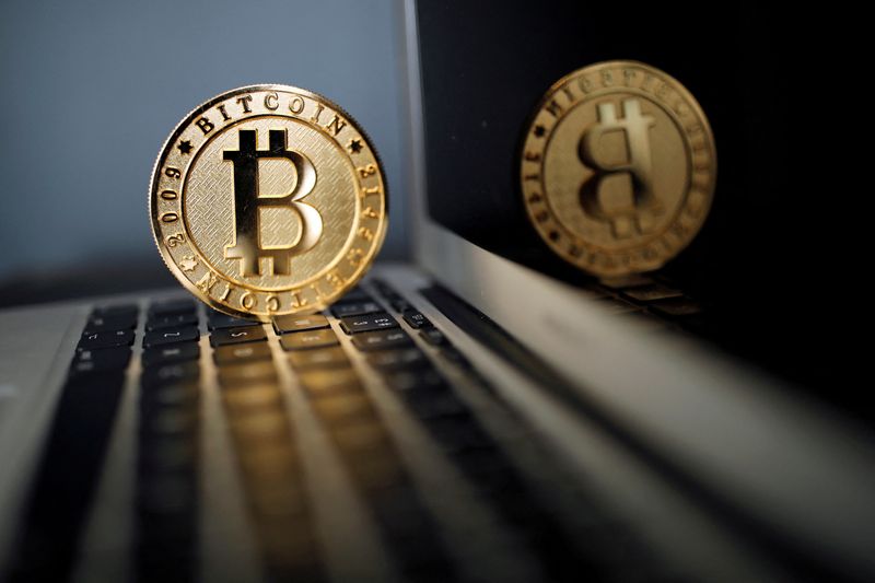 FILE PHOTO: bitcoin representation is seen in an illustration picture taken at La Maison du Bitcoin in Paris