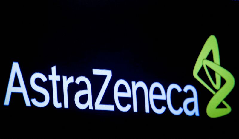 FILE PHOTO: The company logo for pharmaceutical company AstraZeneca is displayed on a screen on the floor at the NYSE in New York