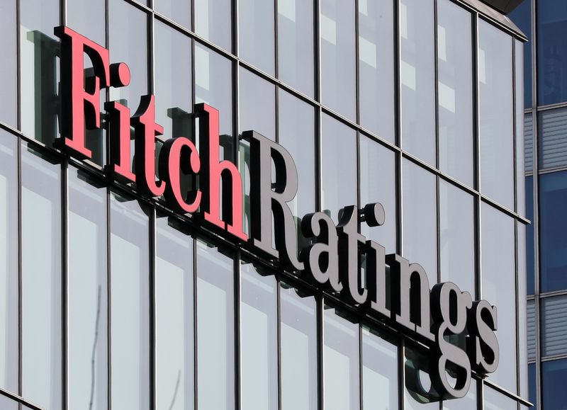 FILE PHOTO: The Fitch Ratings logo is seen at their offices at Canary Wharf financial district in London