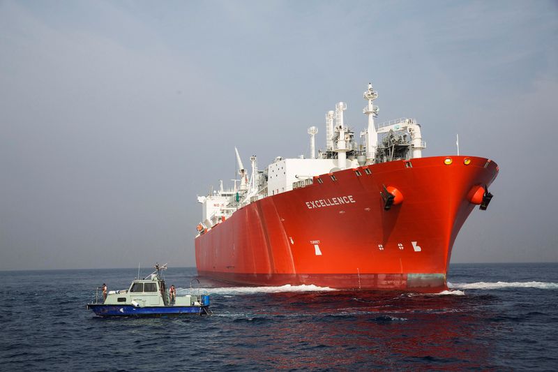 FILE PHOTO: A private security boat circles near a tanker carrying liquefied natural gas in the Mediterranean, some 10 kilometers from Hadera