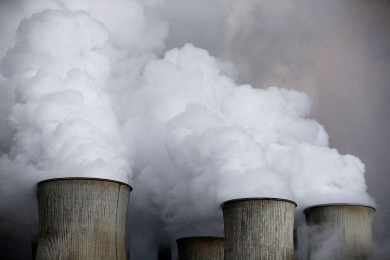 FILE PHOTO: Steam rises from the cooling towers of the coal power plant of RWE in Niederaussem