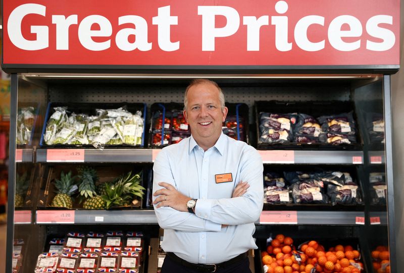 FILE PHOTO: Chief Executive Officer of Sainsbury's Simon Roberts poses inside a Sainsbury’s  supermarket in Richmond, west London