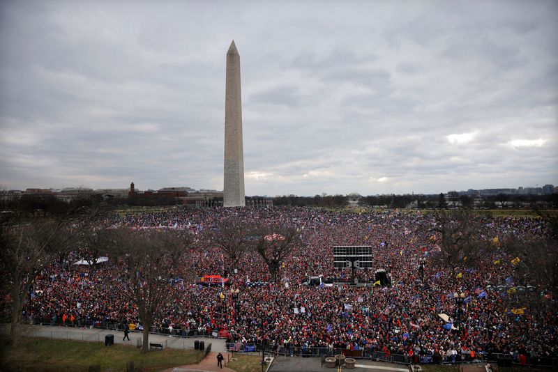 FILE PHOTO: Supporters of U.S. President Donald Trump attend a rally organized at the White House ellipse to contest the certification by the U.S. Congress of the results of the 2020 U.S. presidential election at the Washington Monument by the White 