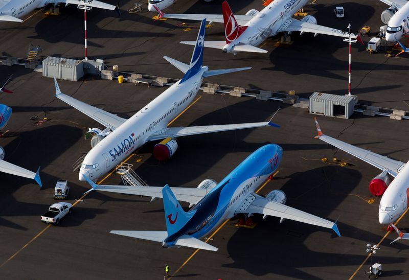 FILE PHOTO: Boeing 737 Max aircraft are parked in a parking lot at Boeing Field in this aerial photo over Seattle