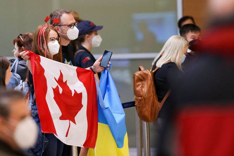 FILE PHOTO: Ukrainians fleeing Russia's invasion arrive in Winnipeg