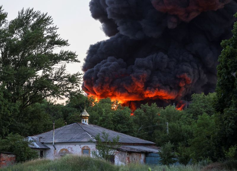 Smoke rises after shelling during Ukraine-Russia conflict in Donetsk